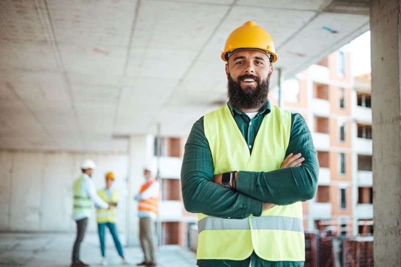 Worker smiling after getting workers' compensation